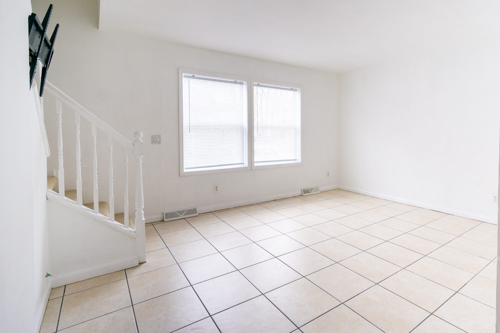 First floor living room with windows.