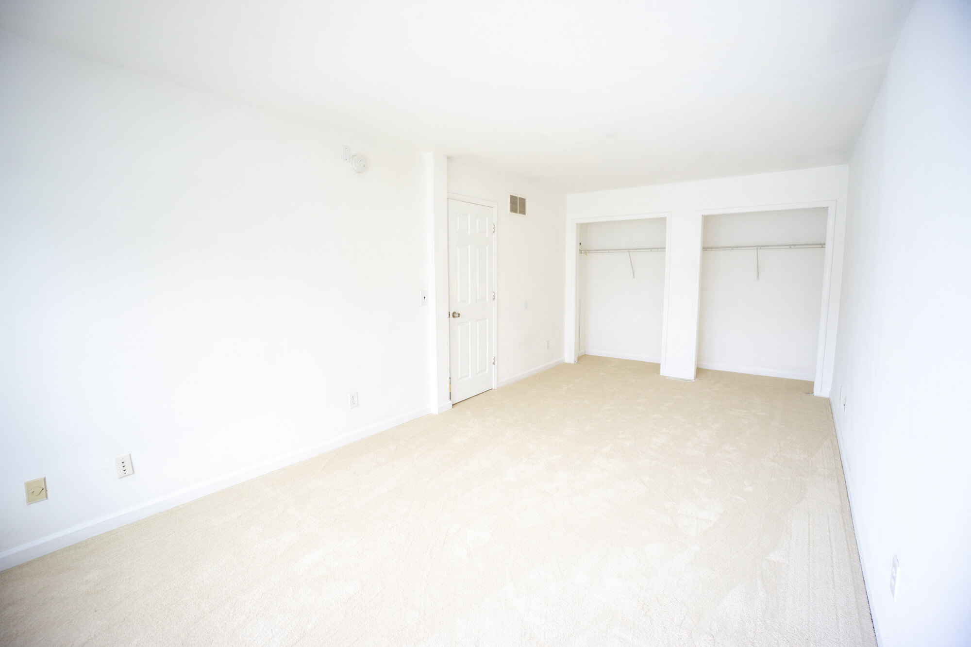 Second floor triple bedroom facing the two closets and door.